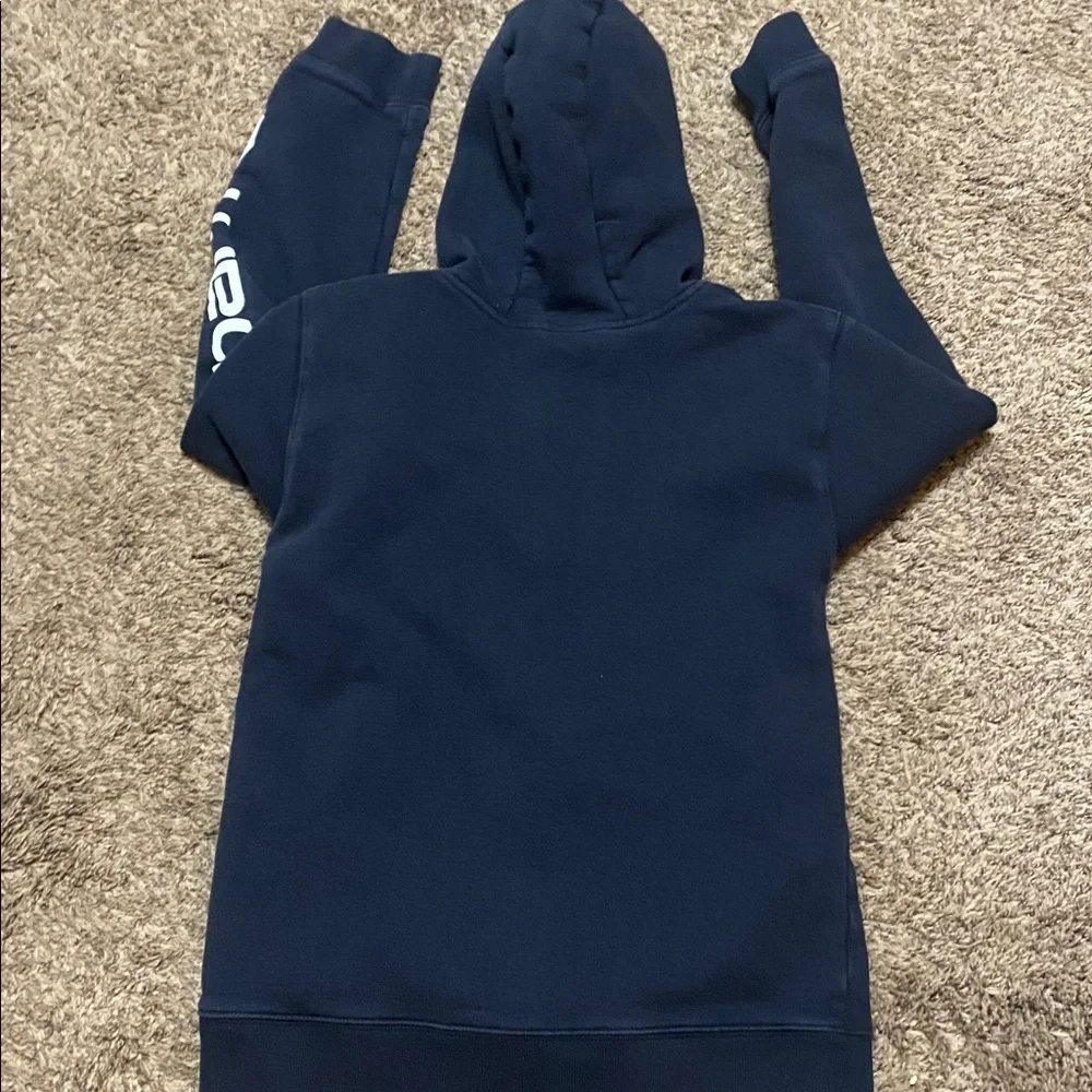 Carhartt Black Zip Up Hoodie With Logo on Sleeve Size L  14-16 Kids
